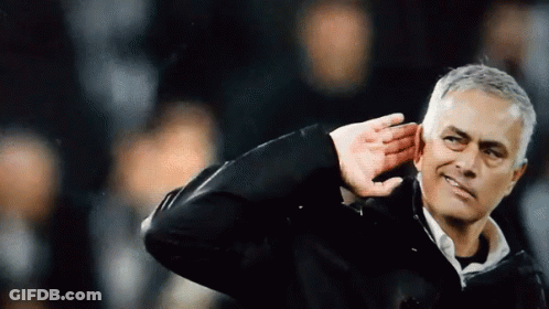 Man Covering Ears Standing On Field GIF