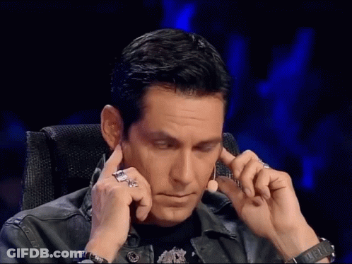 Man Covering Ears Wearing Rolex Watch GIF