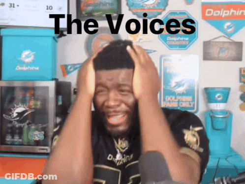 Man Covering Ears With Hands Saying The Voices GIF