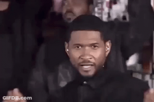 Man Covering Eyes In Front Of Men GIF