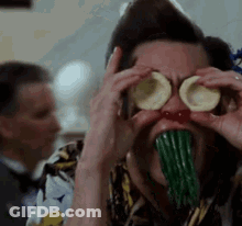 Man Covering Eyes With Sliced Potatoes Eating Green Beans GIF