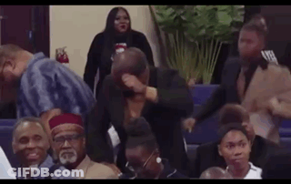 Man Covering Face In Church GIF