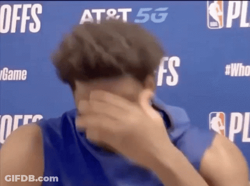 Man Covering Face In Front Of Offs Sign GIF