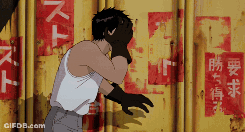 Man Covering Face In Front Of Wall With Chinese Writing GIF