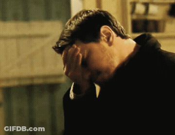 Man Covering Face Looking Down GIF