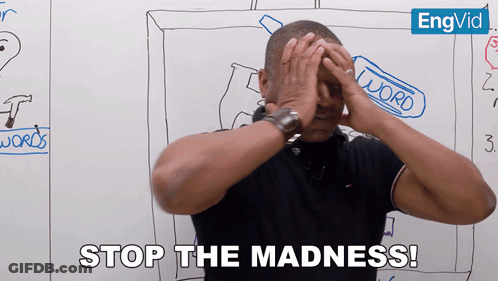 Man Covering Face Saying Stop The Madness GIF