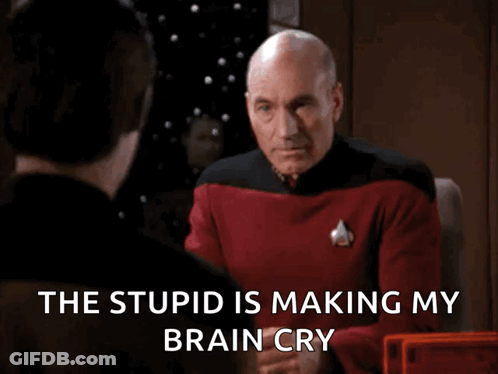 Man Covering Face The Stupid Is Making My Brain Cry GIF