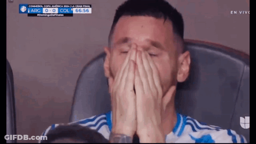 Man Covering Face While Watching Soccer Match GIF