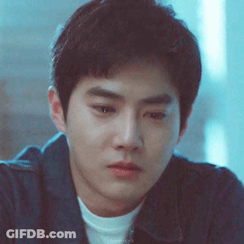 Man Covering Face With Chess.com Logo GIF