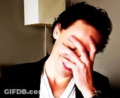 Man Covering Face With Hand GIF