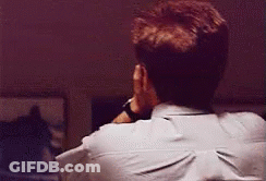 Man Covering Face With Hand Wearing Watch GIF