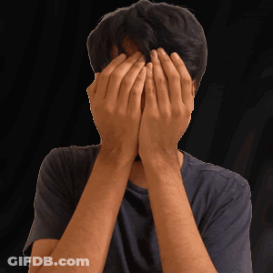 Man Covering Face With Hands In Black Shirt GIF