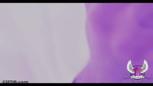 Man Covering Face With Hands In Purple And White GIF