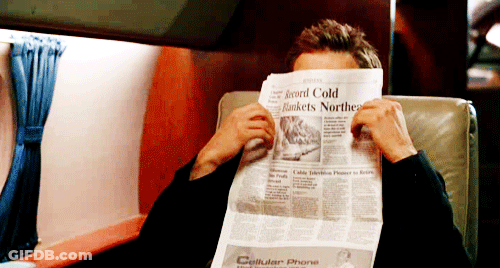 Man Covering Face With Newspaper Saying Cellular Phone GIF