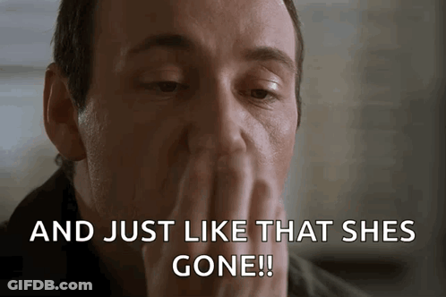Man Covering Mouth And Just Like That She's Gone GIF