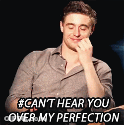 Man Covering Mouth Saying Cant Hear You Over My Perfection GIF
