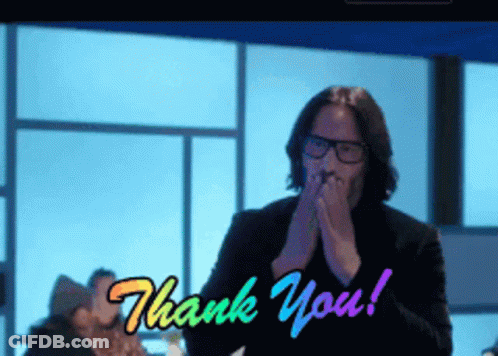 Man Covering Mouth Saying Thank You GIF