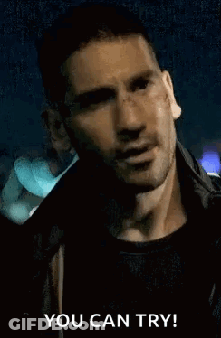 Man Covering Mouth With Blood On Face GIF