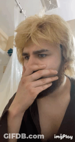 Man Covering Mouth With Hand GIF