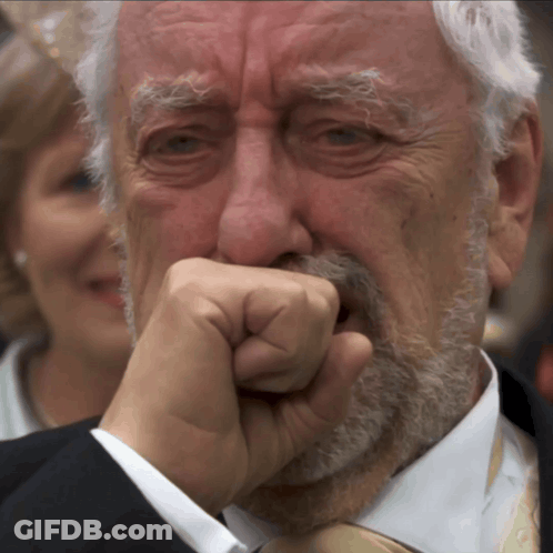 Man Covering Mouth With Hand GIF