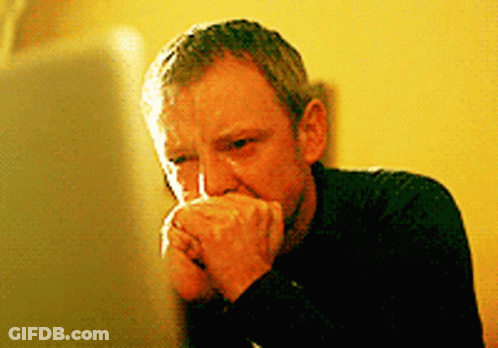 Man Covering Mouth With Hands GIF