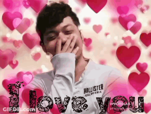 Man Covering Mouth With Hollister Shirt GIF