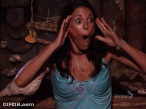 Man Covering Nose Watching Survivor GIF