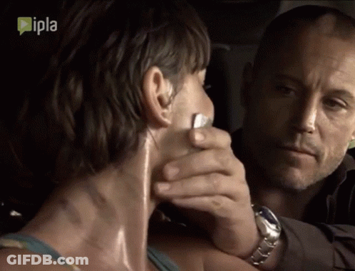 Man Covering Woman's Mouth With Ipla Tape GIF