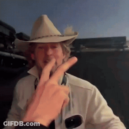 Man Cowboy Hat White Shirt Giving Peace Sign GIF