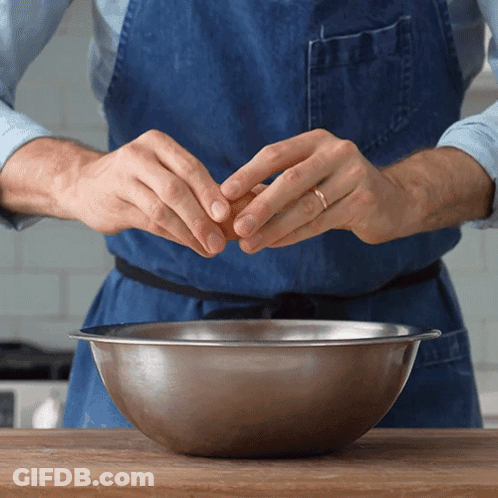 Man Cracking Egg Into Metal Bowl GIF