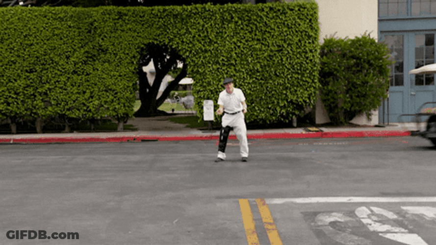 Man Crashed By Gold Cart GIF