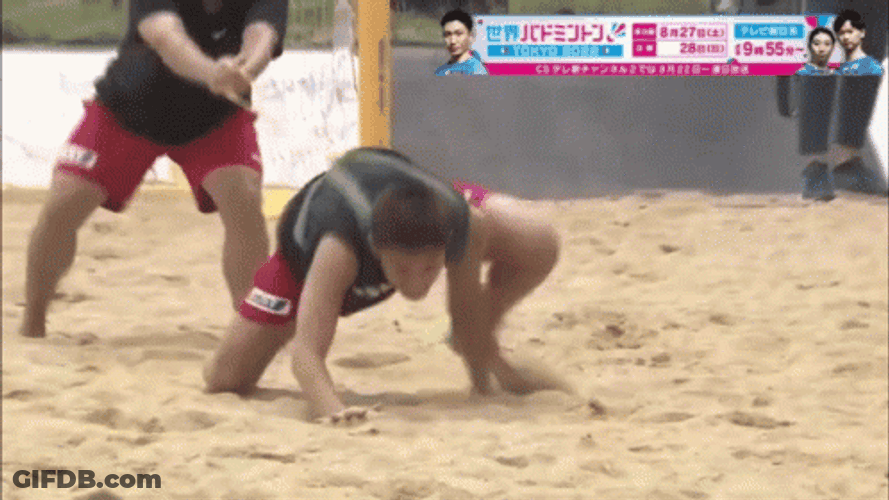 Man Crawling In Beach Wrestling GIF