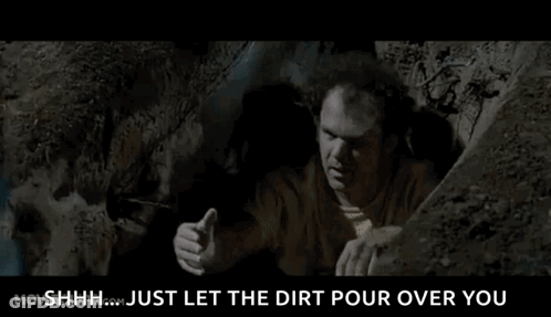 Man Crawling Out Of Dirt Hole GIF