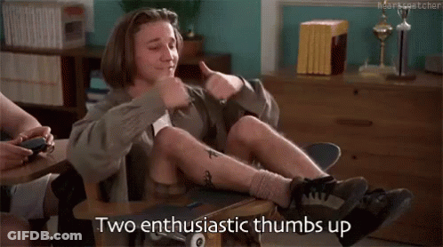 Man Crossed Legs Two Enthusiastic Thumbs Up GIF