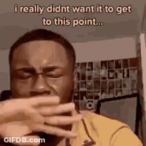 Man Crying Covering Mouth On Phone GIF