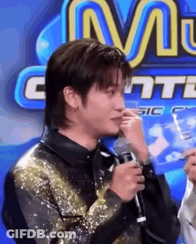 Man Crying Holding Microphone Sign M GIF