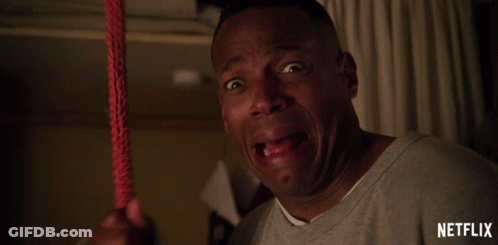 Man Crying Holding Red Rope Netflix GIF