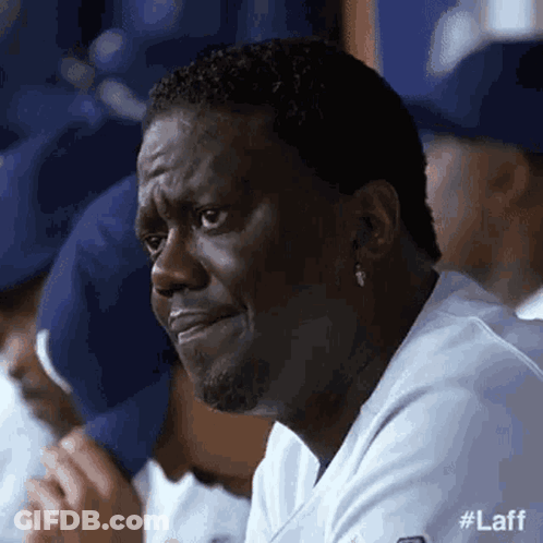 Man Crying In Dugout GIF