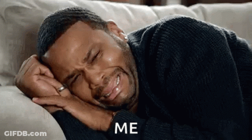 Man Crying Lying On Couch GIF
