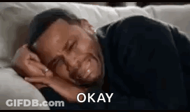 Man Crying On Couch Saying Okay GIF