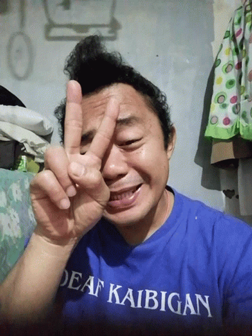 Man Crying Peace GIF
