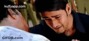 Man Crying While Another Man Looks On GIF