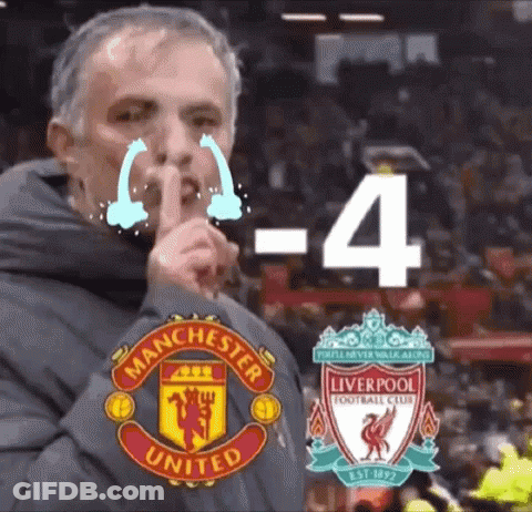 Man Crying With Finger To Mouth In Front Of Manchester United And Liverpool Logos GIF
