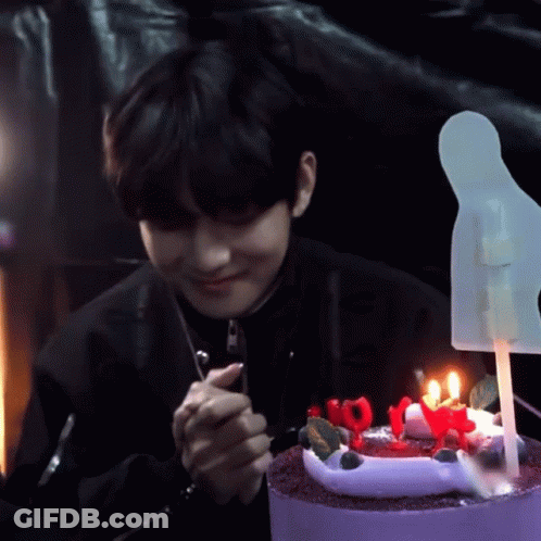 Man Cutting Cake With I Love You Candles GIF
