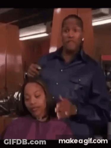 Man Cutting Woman's Hair In Salon GIF