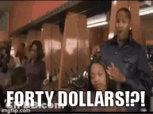 Man Cutting Woman's Hair Saying Forty Dollars GIF