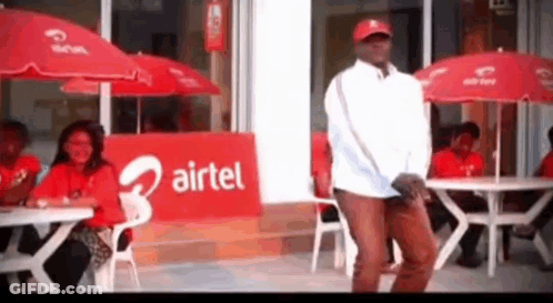 Man Dancing At Airtel Sign GIF
