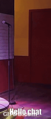 Man Dancing At Microphone Saying Hello Chat GIF