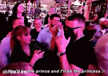 Man Dancing At Party Woman Watches GIF