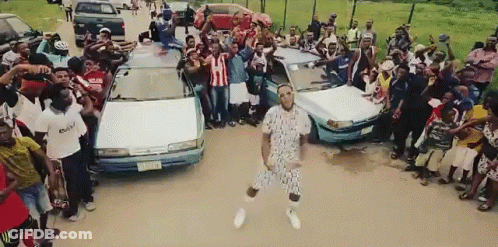 Man Dancing In Crowd, Another In Adidas Shirt GIF